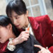 Jeon Do-yeon as Gil Bok-soon choking Lee Yeon as Kim Yeong-ji in the movie Kill Boksoon