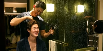 Ryohei Suzuki as Kosuke Saito playful styles the hair of Hio Miyazawa as Ryuta in Egoist.