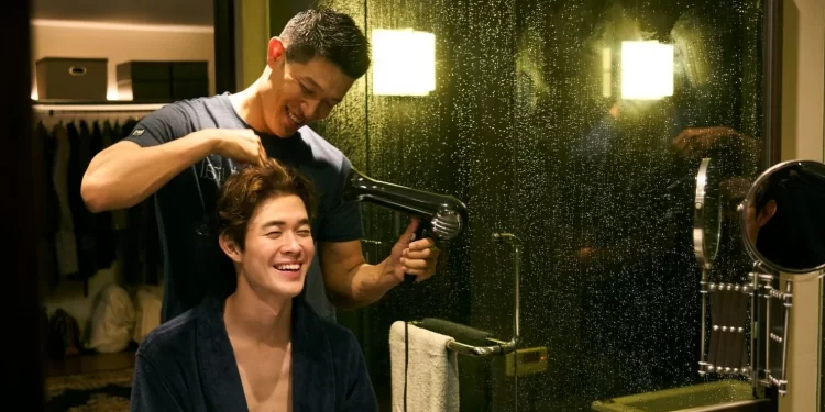 Ryohei Suzuki as Kosuke Saito playful styles the hair of Hio Miyazawa as Ryuta in Egoist.