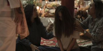 Noi presents Mink to a shaman in The Medium