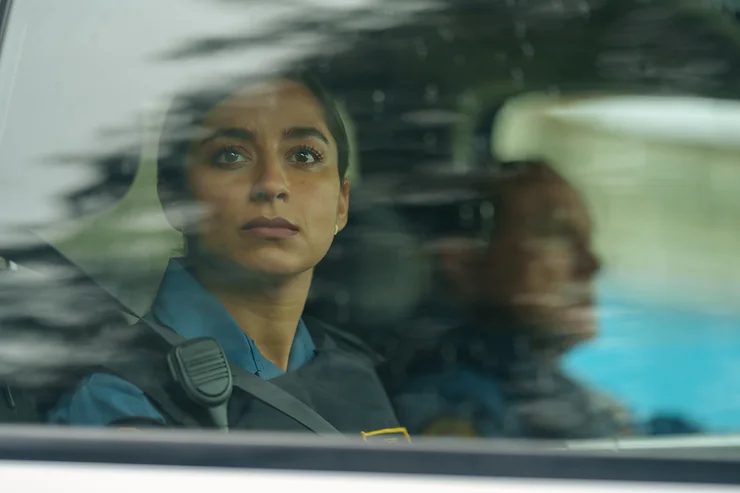 Supinder Wraich as Sabrina Sohal sitting in a car looking out the window in the CBC series Allegiance.