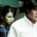 Tae-ju (Kim Ok-bin) stands behind Sang-hyun (Song Kang-ho) in Park Chan-wook's 2009 film "Thirst."