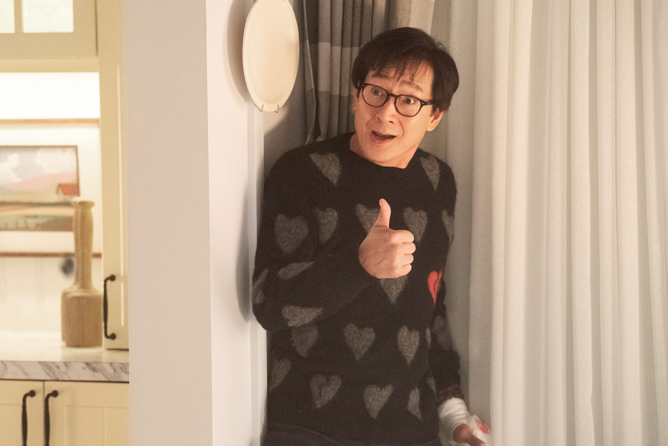 Ke Huy Quan as Marvin Gable giving the thumbs up in Love Hurts