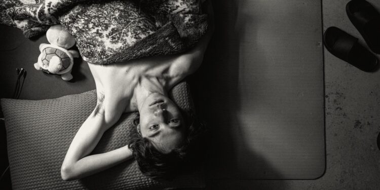 A black-and-white image of Jayden Cheung as the unnamed protagonist in Jun Li's Queerpanorama