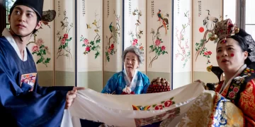 Han Gi-chan, Youn Yuh-jung, and Kelly Marie Tran in The Wedding Banquet.