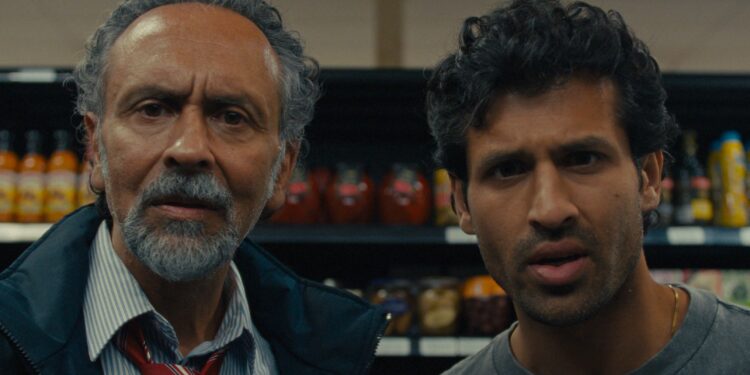 A close up of Bernard White as Vijay and Saamer Usmani as Ashish staring straight ahead puzzled in Shook