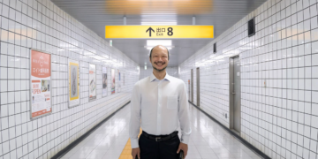 Yamato Kochi as The Walking Man in Exit 8