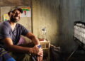 A behind-the-scenes photo of director Mahesh Pailoor on the set of his film Paper Flowers.