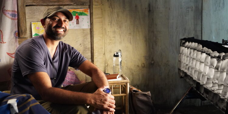 A behind-the-scenes photo of director Mahesh Pailoor on the set of his film Paper Flowers.