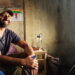 A behind-the-scenes photo of director Mahesh Pailoor on the set of his film Paper Flowers.